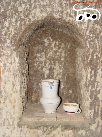 Jug and cup of a cellar